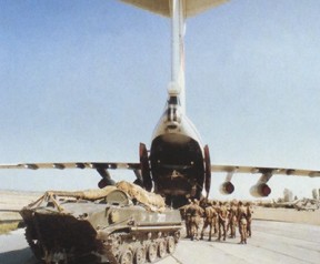 A tank being loaded in an Il-76.